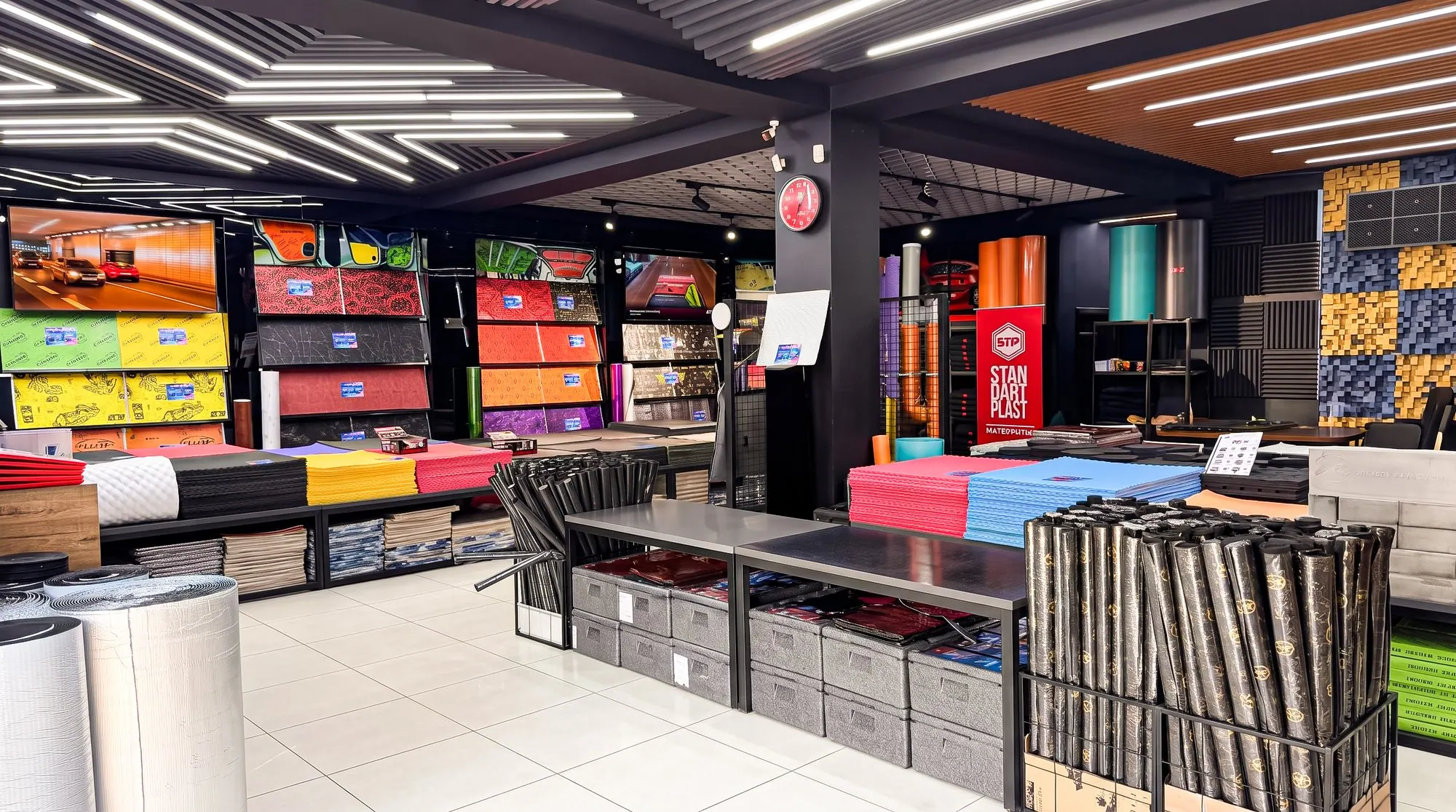 The StP Timurshop showroom floor, with material displays along both walls